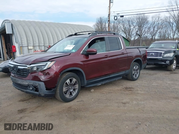 2018 Honda Ridgeline RTL-T with VIN 5FPYK3F69JB010983, listed as a IAAI auction lot 41781716 with 45,494 mi miles and . Bid and sale history available at DreamBid. Image 2.