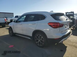 2021 BMW X1 xDrive28i with VIN WBXJG9C09M5S71263, listed as a Copart auction lot 46374565 with 61,537 mi miles and Salvage Title. Bid and sale history available at carsss.com. Image 2.