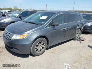 2012 Honda Odyssey EX-L with VIN 5FNRL5H64CB131197, listed as a IAAI auction lot 41829107 with 215,115 mi miles. Bid and sale history available at carsss.com. Image 18.