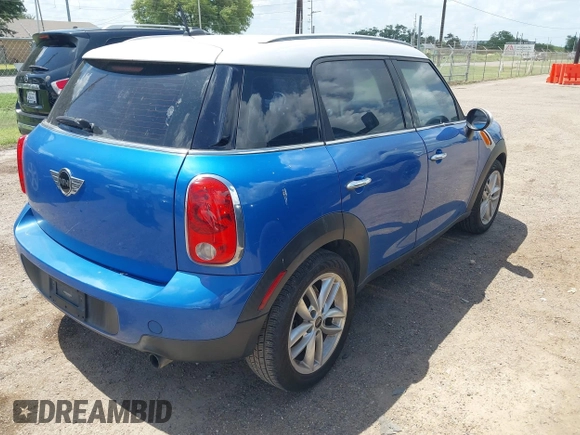 2014 MINI Countryman with VIN WMWZB3C52EWR40215, listed as a IAAI auction lot 42687571 with 106,338 mi miles and . Bid and sale history available at DreamBid. Image 4.