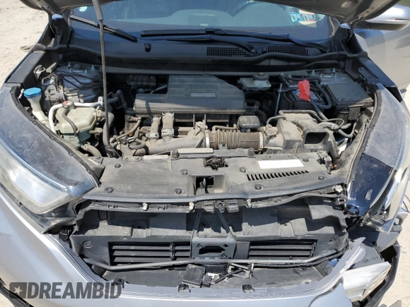 2018 Honda CR-V Touring with VIN 7FARW1H9XJE001467, listed as a Copart auction lot 55222005 with 65,611 mi miles and Salvage title. Bid and sale history available at DreamBid. Image 12.