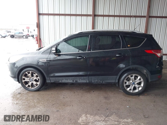 2014 Ford Escape Titanium z VIN 1FMCU0J96EUA84108, wystawiony jako IAAI lot #42114002 z przebiegiem 176 735 mil mil oraz . Historia ofert i sprzedaży dostępna na DreamBid. Obrazek 14.