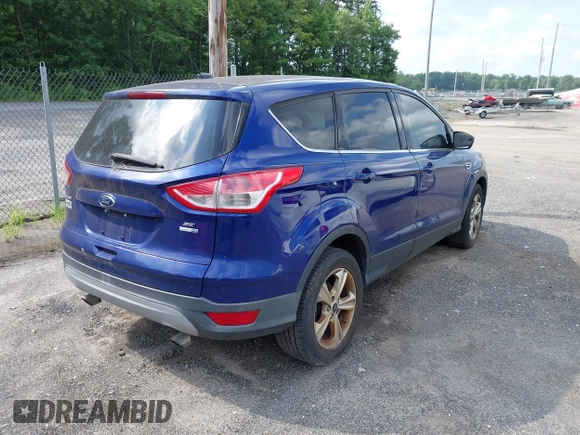 2014 Ford Escape SE z VIN 1FMCU9G91EUA06332, wystawiony jako IAAI lot #42727426 z przebiegiem 173 713 mil mil oraz . Historia ofert i sprzedaży dostępna na DreamBid. Obrazek 4.