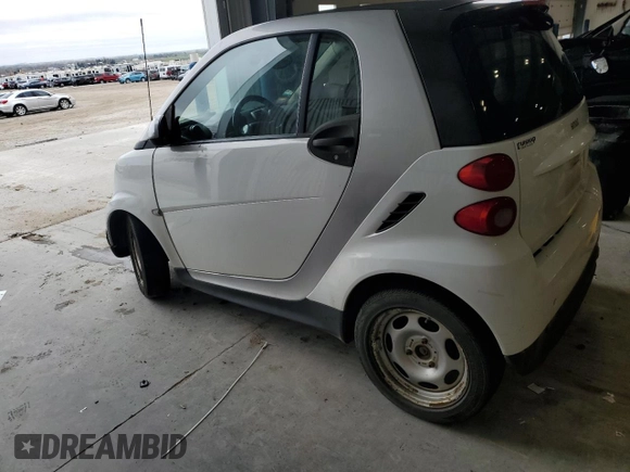 2013 Smart fortwo Pure с VIN WMEEJ3BA9DK626037, выставлен на аукционе Copart как лот 54573255 с пробегом 66 070 миль миль и Чистый • Clean title. История ставок и продаж доступна на DreamBid. Изображение 2.