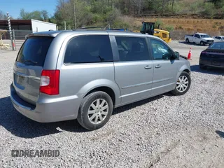 2015 Chrysler Town & Country Touring with VIN 2C4RC1BG7FR552317, listed as a IAAI auction lot 41972396 with Not Provided miles and . Bid and sale history available at carsss.com. Image 4.