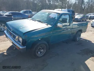 1997 Nissan Trucks 2WD XE with VIN 1N6SD11S5VC339455, listed as a IAAI auction lot 41627409 with 204,025 mi miles. Bid and sale history available at carsss.com. Image 2.