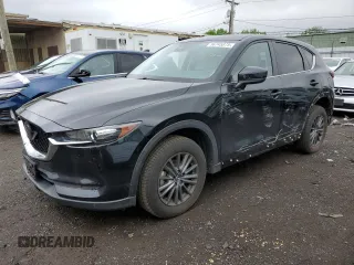 2021 Mazda CX-5 Touring z VIN JM3KFBCM4M0473611, wystawiony jako Copart lot #56745875 z przebiegiem 22 294 mil mil oraz Szkody całkowita. Historia ofert i sprzedaży dostępna na DreamBid. Obrazek 1.