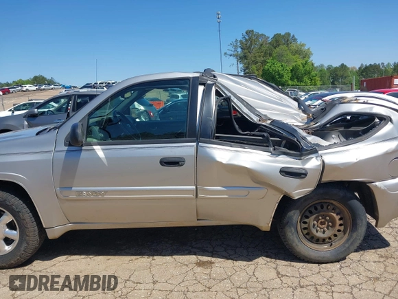 2004 GMC Envoy SLE with VIN 1GKDS13S242420100, listed as a IAAI auction lot 41963800 with 341,395 mi miles and . Bid and sale history available at DreamBid. Image 14.