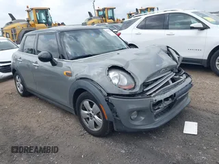 2015 MINI Hardtop 4 Door z VIN WMWXS5C56FT830418, wystawiony jako IAAI lot #42132285 z przebiegiem 111 428 mil mil oraz . Historia ofert i sprzedaży dostępna na DreamBid. Obrazek 1.