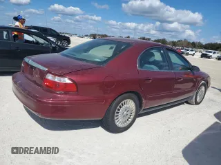 2004 Mercury Sable GS z VIN 1MEFM50U44G614186, wystawiony jako Copart lot #77822494 z przebiegiem 59 829 mil mil oraz Szkoda całkowita • Salvage title. Historia ofert i sprzedaży dostępna na DreamBid. Obrazek 3.
