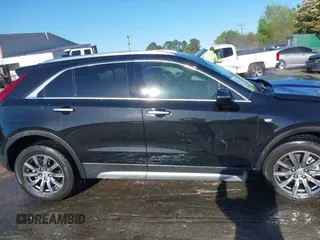 2021 Cadillac XT4 FWD Premium Luxury with VIN 1GYFZCR43MF052422, listed as a IAAI auction lot 41985859 with 25,112 mi miles. Bid and sale history available at carsss.com. Image 13.