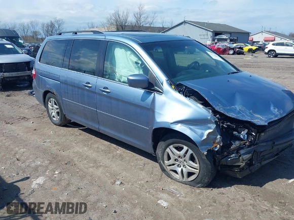2007 Honda Odyssey EX-L with VIN 5FNRL38727B092077, listed as a IAAI auction lot 41972810 with 211,770 mi miles and . Bid and sale history available at DreamBid. Image 1.