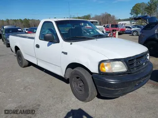 1999 Ford F-150 Work Series with VIN 1FTZF172XXNA84005, listed as a IAAI auction lot 41683608 with 289,294 mi miles. Bid and sale history available at carsss.com. Image 1.