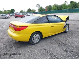 2001 Saturn SC z VIN 1G8ZY12721Z325482, wystawiony jako IAAI lot #42263797 z przebiegiem Nie podano mil oraz . Historia ofert i sprzedaży dostępna na DreamBid. Obrazek 4.