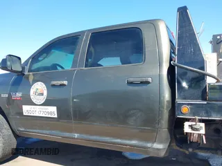 2012 Ram 2500 ST z VIN 3C6TD5CT6CG290580, wystawiony jako IAAI lot #41755239 z przebiegiem 207 282 mil mil oraz . Historia ofert i sprzedaży dostępna na DreamBid. Obrazek 14.