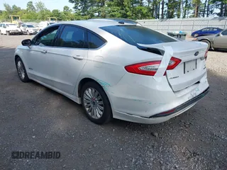 2013 Ford Fusion SE Hybrid with VIN 3FA6P0LUXDR349019, listed as a IAAI auction lot 42800125 with 143,089 mi miles and . Bid and sale history available at DreamBid. Image 3.