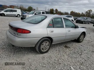 1998 Ford Escort SE with VIN 1FAFP13P6WW182609, listed as a Copart auction lot 77876884 with 165,162 mi miles and Salvage Title. Bid and sale history available at carsss.com. Image 3.