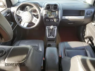 2016 Jeep Compass Latitude with VIN 1C4NJDEB9GD764730, listed as a Copart auction lot 76808544 with 123,937 mi miles and Clean Title. Bid and sale history available at carsss.com. Image 8.