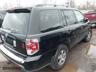 2007 Honda Pilot EX-L with VIN 5FNYF28557B028997, listed as a IAAI auction lot 41742267 with 217,114 mi miles. Bid and sale history available at carsss.com. Image 4.