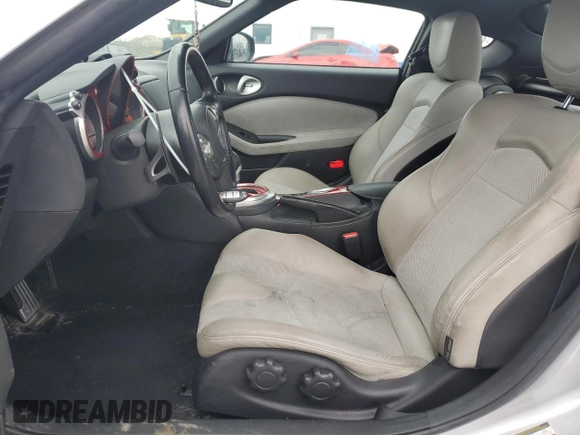 2009 Nissan 370Z Touring with VIN JN1AZ44E89M409220, listed as a Copart auction lot 43701504 with 145,099 mi miles and Salvage Title. Bid and sale history available at carsss.com. Image 7.