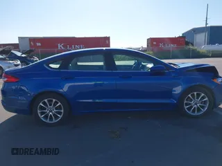2017 Ford Fusion SE z VIN 3FA6P0H73HR260806, wystawiony jako IAAI lot #42311343 z przebiegiem 143 094 mil mil oraz . Historia ofert i sprzedaży dostępna na DreamBid. Obrazek 13.