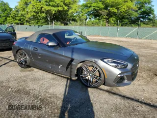 2020 BMW Z4 sDriveM40i z VIN WBAHF9C00LWW76934, wystawiony jako Copart lot #55810755 z przebiegiem 52 230 mil mil oraz Szkody całkowita. Historia ofert i sprzedaży dostępna na DreamBid. Obrazek 4.