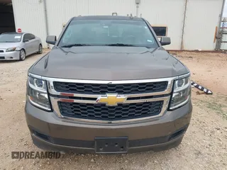 2015 Chevrolet Tahoe LT z VIN 1GNSCBKC2FR685780, wystawiony jako IAAI lot #42354130 z przebiegiem 101 617 mil mil oraz . Historia ofert i sprzedaży dostępna na DreamBid. Obrazek 12.
