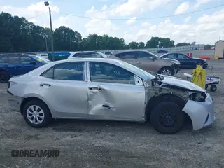 2016 Toyota Corolla L z VIN 2T1BURHE7GC625979, wystawiony jako IAAI lot #42503444 z przebiegiem 162 858 mil mil oraz . Historia ofert i sprzedaży dostępna na DreamBid. Obrazek 13.