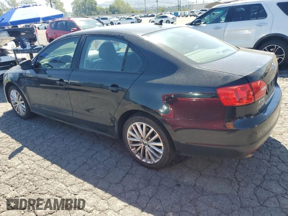 2012 Volkswagen Jetta SEL with VIN 3VWLP7AJ0CM327814, listed as a Copart auction lot 52235685 with 97,705 mi miles and Salvage title. Bid and sale history available at DreamBid. Image 2.