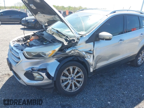 2018 Ford Escape Titanium with VIN 1FMCU9J96JUA33500, listed as a IAAI auction lot 42121736 with 105,430 mi miles and . Bid and sale history available at DreamBid. Image 6.