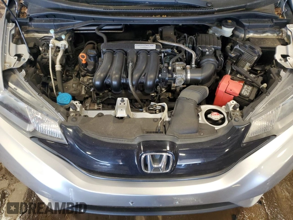 2016 Honda Fit LX z VIN JHMGK5H50GX026653, wystawiony jako Copart lot #57766675 z przebiegiem 68 656 mil mil oraz Szkody całkowita. Historia ofert i sprzedaży dostępna na DreamBid. Obrazek 11.