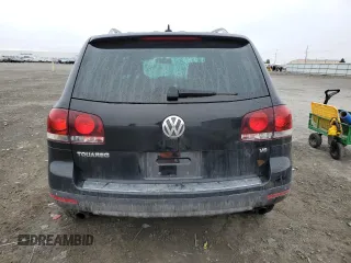 2008 Volkswagen Touareg V6 z VIN WVGLE77L28D026719, wystawiony jako Copart lot #48539225 z przebiegiem Nie podano mil oraz Szkoda całkowita • Salvage title. Historia ofert i sprzedaży dostępna na DreamBid. Obrazek 6.