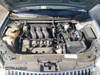 2006 Mercury Montego Luxury z VIN 1MEFM40116G601835, wystawiony jako Copart lot #85929224 z przebiegiem Nie podano mil oraz Szkoda całkowita • Salvage title. Historia ofert i sprzedaży dostępna na DreamBid. Obrazek 11.