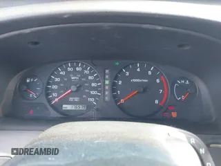 2000 Nissan Frontier XE z VIN 1N6DD21SXYC366427, wystawiony jako IAAI lot #42111404 z przebiegiem 176 579 mil mil oraz . Historia ofert i sprzedaży dostępna na DreamBid. Obrazek 7.