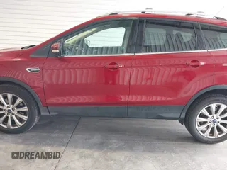 2017 Ford Escape Titanium with VIN 1FMCU9J91HUA32264, listed as a IAAI auction lot 42050273 with 201,128 mi miles. Bid and sale history available at carsss.com. Image 14.