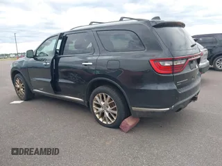 2014 Dodge Durango Citadel with VIN 1C4SDJET5EC314304, listed as a IAAI auction lot 42682540 with 213,651 mi miles and . Bid and sale history available at DreamBid. Image 3.