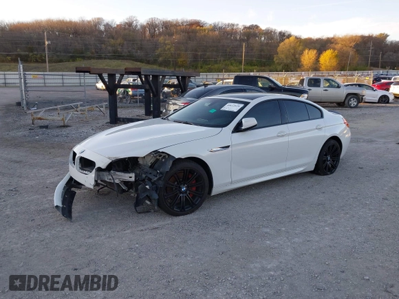 2015 BMW 6 Series 640i with VIN WBA6A0C54FGB53785, listed as a IAAI auction lot 40612020 with 67,524 mi miles and . Bid and sale history available at DreamBid. Image 2.