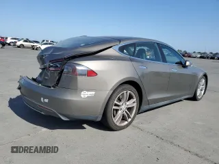 2016 Tesla Model S 90D with VIN 5YJSA1E2XGF133933, listed as a Copart auction lot 60736445 with 203,063 mi miles and Salvage title. Bid and sale history available at DreamBid. Image 3.