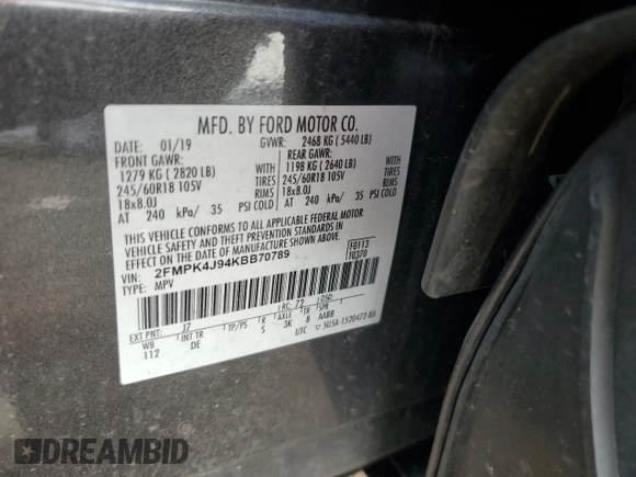2019 Ford Edge SEL z VIN 2FMPK4J94KBB70789, wystawiony jako Copart lot #52565675 z przebiegiem 82 888 mil mil oraz Szkoda całkowita • Salvage title. Historia ofert i sprzedaży dostępna na DreamBid. Obrazek 13.