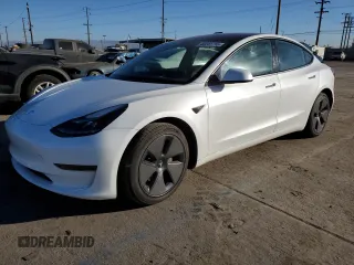 2023 Tesla Model 3 with VIN 5YJ3E1EA6PF605674, listed as a Copart auction lot 42241715 with 48,601 mi miles and Salvage Title. Bid and sale history available at DreamBid. Image 1.