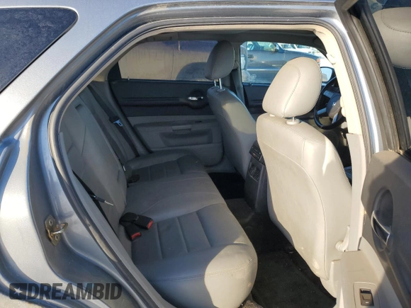 2006 Dodge Magnum R/T z VIN 2D4GV57256H187683, wystawiony jako Copart lot #87879585 z przebiegiem 260 895 mil mil oraz Szkody całkowita. Historia ofert i sprzedaży dostępna na DreamBid. Obrazek 10.