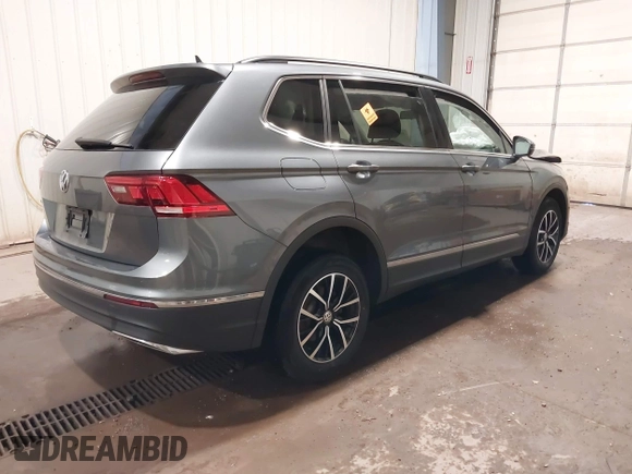 2021 Volkswagen Tiguan SE with VIN 3VV3B7AX3MM118463, listed as a IAAI auction lot 42138702 with 48,058 mi miles and . Bid and sale history available at DreamBid. Image 4.