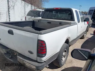 2003 Ford F-150 XL with VIN 1FTRX17W33NB65471, listed as a IAAI auction lot 41627618 with 1 mi miles. Bid and sale history available at carsss.com. Image 4.