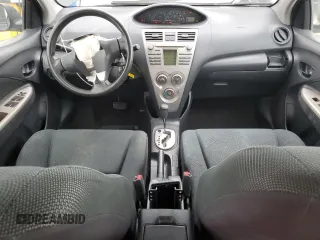 2009 Toyota Yaris with VIN JTDBT903291324461, listed as a Copart auction lot 54769875 with 141,777 mi miles and Salvage Title. Bid and sale history available at DreamBid. Image 8.
