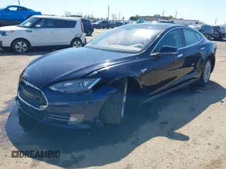 2014 Tesla Model S 60 with VIN 5YJSA1H11EFP47897, listed as a IAAI auction lot 41802285 with Not Provided miles and . Bid and sale history available at DreamBid. Image 18.