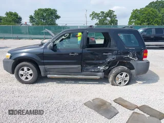 2007 Ford Escape XLS with VIN 1FMYU02ZX7KB90581, listed as a IAAI auction lot 42430544 with 164,595 mi miles and . Bid and sale history available at DreamBid. Image 14.