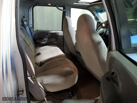 2001 Ford F-150 SuperCrew XLT with VIN 1FTRW08L41KD94810, listed as a Copart auction lot 72144184 with 191,313 mi miles and Salvage Title. Bid and sale history available at carsss.com. Image 10.
