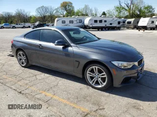 2014 BMW 4 Series 428i xDrive with VIN WBA3N5C59EF716920, listed as a Copart auction lot 53915275 with 125,300 mi miles and Salvage title. Bid and sale history available at DreamBid. Image 4.
