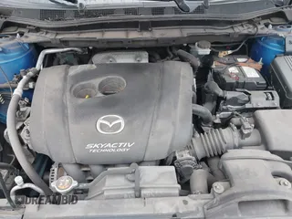 2014 Mazda CX-5 Sport with VIN JM3KE4BE6E0336504, listed as a IAAI auction lot 41961244 with 125,150 mi miles. Bid and sale history available at carsss.com. Image 10.