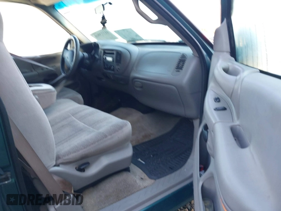 1997 Ford F-150 with VIN 1FTDX1728VND00843, listed as a IAAI auction lot 41773901 with 143,747 mi miles and . Bid and sale history available at DreamBid. Image 5.